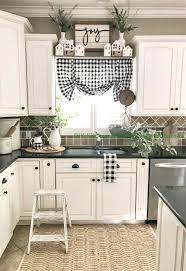 A window valance made from neutral buffalo check fabric compliments this simple farmhouse kitchen perfectly. Pin On Dream House