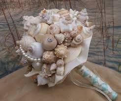 Our distinctive design packages are not only designed to be our most elegant and timeless packages, they include everything you need while still being. Aqua And Coral Bridal Bouquet Bridesmaid Seashell Bouquet Beach Bouquet Seaside Bouquet Summer Bouquet Wedding Bouquet