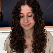 Ready to love your curls? To get this level of definition, we went back to  the basics: Hydration. We used Ouidad's unique layering technique to ensure  moisture is locked deep inside the