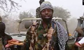 A young man pleads for 'assistance' from what appears to be a woodland area. Boko Haram Leader Threatens The Battle Is Just Beginning In Chilling New Video World News Express Co Uk