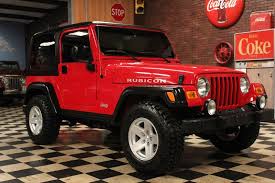 Image result for Flame Red 2006 Jeep