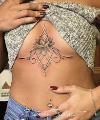Lotus Flower Sternum Tattoo Tattoos Boho Tattoos Tattoos For Women