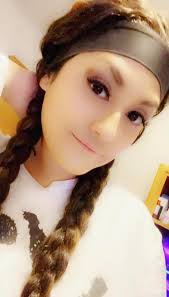 Lighting candle for deceased daughter