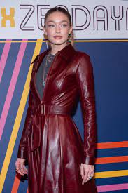 March 2nd Gigi Hadid Attends The Tommynow Tommyxzendaya Fashion Show At Theatre Des Champs Elysees In Paris Franc Vinyl Fashion Fashion Leather Trench Coat
