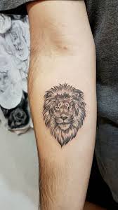 24 Small Lion Tattoo Designs And Ideas Petpress Small Lion Tattoo Mens Lion Tattoo Simple Lion Tattoo