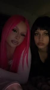 Starfire & raven in sister form 🩷🖤