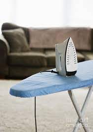 Maybe you would like to learn more about one of these? Iron On An Ironing Board Photograph By Ben Sandall