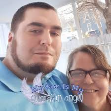 What ideas for floral arrangement above the cabinet in a bathroom?