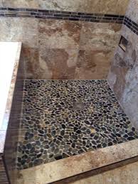 Fabulous shower features walls clad in grey and white marble tiles fitted with a shower bench atop a black river rock shower floor. Wrong Grout For Flat Pebble Shower Floor Terry Love Plumbing Advice Remodel Diy Professional Forum