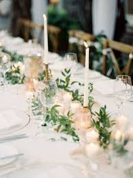 15 Summer Wedding Centerpieces You Ll Fall In Love With Mywedding Candle Wedding Centerpieces Summer Wedding Centerpieces Wedding Table
