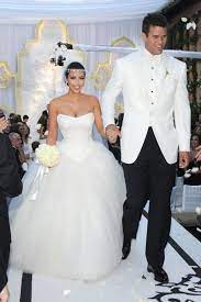 On Our List Of Most Extravagant Celebrity Weddings The Kim Kardashian And Kris Humphri Kim Kardashian Wedding Dress Top Wedding Dresses Kim Kardashian Wedding