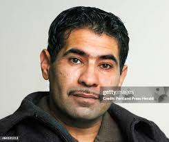Staff Photo by Gordon Chibroski. November 28, 2006. Abdul Azimi at... News  Photo