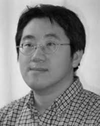 Generating discriminating cartoon faces using interacting snakes