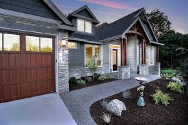 All you need to do is to make your steps of stone and you will gel more elegant look of your outdoors. Front Entryway The Genesis Family Super Ranch With Daylight Basement Traditional Exterior Portland By Cascade West Development Houzz