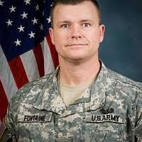 Lt. Gen. David Rodriguez (right) stops for a photo