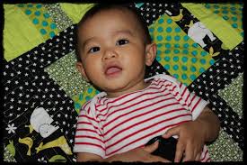 A baby quilt using 5 fat quarters