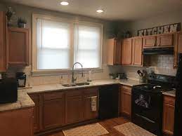 Choosing kitchen cabinets for your style. Farmhouse Kitchen Remodel Older Kitchen Remodel On A Budget With Fantasy White Gra Farmhouse Kitchen Design Black Appliances Kitchen Farmhouse Kitchen Remodel