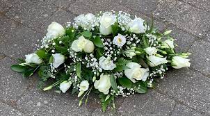 Sympathy flowers for funerals bring emotions and words into a physical and tangible express your sympathy with funeral flower arrangements that we have specifically designed on our website at lolaflora.com. Child Baby Coffin Double Ended Funeral Spray Flowers White Calla Lily Willow House Flowers Funeral Florist