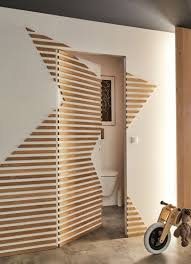 Une Ambiance Africaine Pour Habiller Vos Murs Leroy Merlin Deco Porte Interieure Deco Murale Bois Mur Du Salon