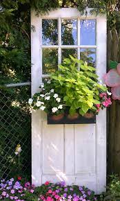 Repurposing, reusing and upcycling an old door is just a great idea. 45 Artistic And Practical Repurposed Old Door Ideas Garden Art Garden Doors Garden Design