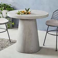 International concepts round top pedestal dining table with black base. Concrete Outdoor Round Pedestal Dining Table