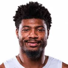 Marcus smart, seemingly unfazed, plopped into the passenger seat of the team's van. Marcus Smart Basketball Player Proballers