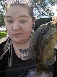 Lady fishing groups for local pond fishing