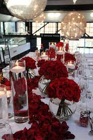 Grab your new spouse and pause for a kiss beneath a shower of rose petals. Gallery Home Doltone House Red Rose Wedding Red Wedding Theme Red Roses Centerpieces