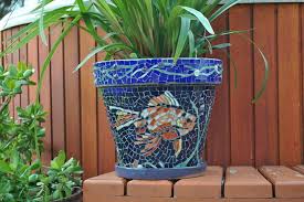 Vintage mccoy pottery grapes and leaves planter. Free Shipping Mosaic Koi Fish Planter Stained Glass In Blue Etsy Mosaic Flower Pots Mosaic Garden Art Mosaic Pots