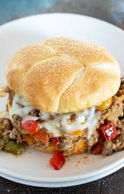 Add the ground beef, onion, bell pepper, and garlic to the oil once hot and sauteé until meat is cooked through, about 10 minutes. Philly Cheesesteak Sloppy Joes Wonkywonderful