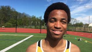 Rush-Henrietta's Thomas warming up at states