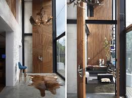 This House Has A Huge Set Of Doors That Are 23 Feet Tall Interior Design Website Interior Railings Interior Wood Shutters