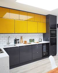 As a matter of fact, a trend i adore that has gotten extremely prominent is the utilization of a somewhat lighter shade on the top cabinets from the shade of yellow you use on the lower cabinets. 26 Bold Black And Yellow Kitchen Designs Digsdigs