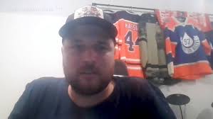 Edmonton Oilers superfans cross ocean, paint body in blue and orange to  watch games