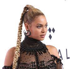 Beyonce Rocking A Black High Neck Gown Statement Earrings And A High Ponytail At A Tidal Event Beyonce Outfits Curly Hair Styles Naturally Natural Hair Updo
