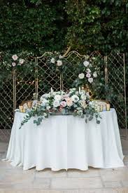 Christine And Robert S Wedding In Moorpark California Sweetheart Table Wedding Wedding Trellis Wedding Couple Table