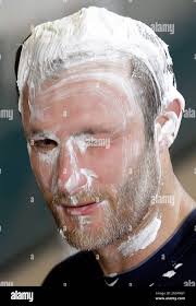 Milwaukee Brewers' Jonathan Lucroy is seen after getting shaving cream  rubbed