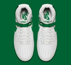 Both pairs utilize an all white leather upper. Nike Air Force 1 Og White Green Sole Collector