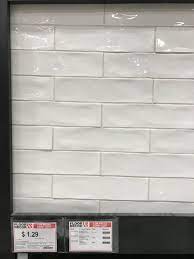 Porcelain floor and wall tile draws inspiration from artisan cement tiles. Before After Our Master Bathroom Shira Bess Interiors