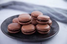 Draw a rubber spatula halfway through the mixture and fold until incorporated, giving the bowl a quarter turn with each fold. Chocolate Macarons Recipe Biscuit Recipes Sbs Food