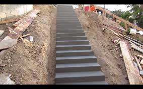 Floating decks are wood decks that rest on the ground and are not a deck does not need a handrail or stairs if its walking surface is under 30 inches above the ground. How To Build Stairs Watch Concrete Stairway Construction Video