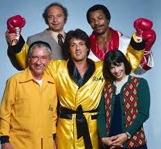 The promoter/ring announcer miles jergens announces over the loudspeaker that the match was the greatest exhibition of guts and stamina in the history of the ring; Rocky Balboa Rare Si Photos Sports Illustrated