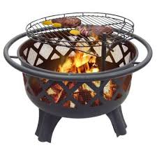 Its unique features include a cooking grate for convenient grilling, a mesh screen for safety and a poker. Hampton Bay Crossfire 29 50 In Steel Fire Pit With Cooking Grate 25915 At The Home Depot Cool Fire Pits Portable Fire Pits Fire Pit With Cooking Grate
