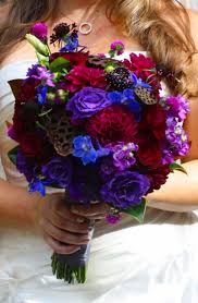 Jewel Tone Brides Bouquet Burgundy Purple And Blue Flowers With Added Texture Form Lotus P Indian Wedding Flowers Purple Wedding Flowers Blue Wedding Flowers
