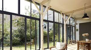 Sa structure permet d'intégrer dans les vitrages des stores à toile opaque (occultation totale) ou translucide (gestion des apports solaires). Baie Vitree Sur Rails A Galandage Seuil Extra Plat Cote Maison