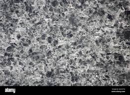 Granito Gris Oscuro Con Pequenas Inclusiones De Color Blanco Primer Plano De Superficie Plana Pulida De Piedra Natural Fondo Patron Textura Fotografia De Stock Alamy