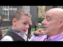 Eight-year-old Bailey celebrates his Pride of Britain win