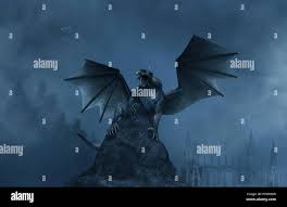 3d Fantasy aggressive dragon on the rock Stock Photo - Alamy