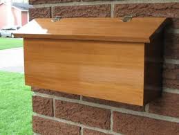 Increase your curb appeal with a letter box that suits your house's style. Cedar Mailbox Reader S Gallery Fine Woodworking Wooden Mailbox Mailbox Woodworking Plans Diy Mailbox