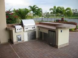 It uses whitewashed brick for a soothing aged appearance, plus neutral gray accents on the counter. Pre Built Outdoor Kitchen Home Design John Lewis